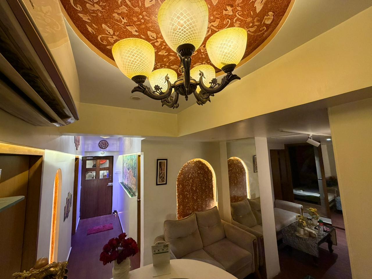 Reception with chandelier and lounge seating